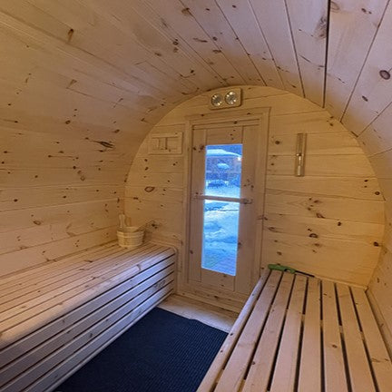 Door of true north barrel sauna