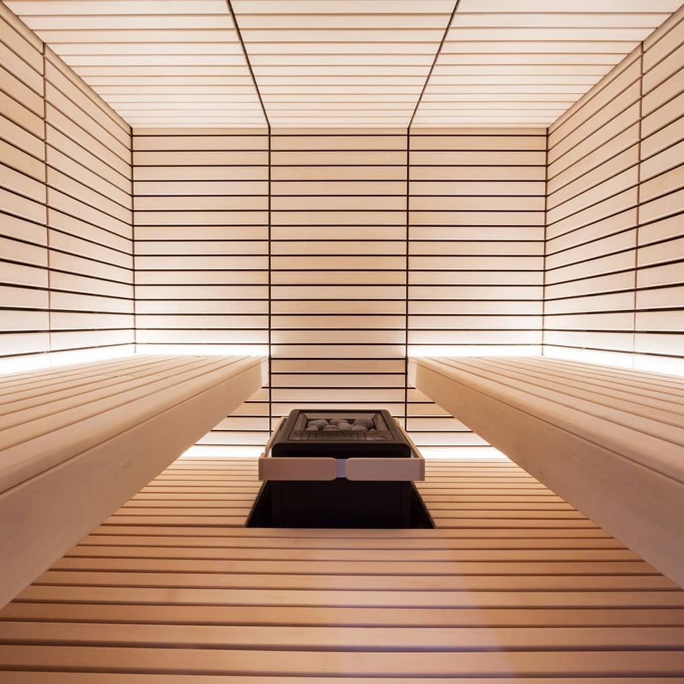 White Custom Sauna With Recessed Harvia Virta Heater