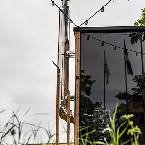 HUUM Thru-Wall Sauna Wood Stove Rear Exit Chimney Kit Stainless Steel - installed in sauna room