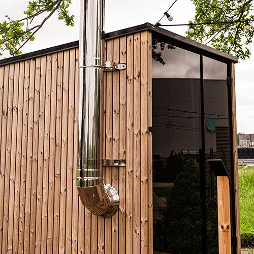 HUUM Thru-Wall Sauna Wood Stove Rear Exit Chimney Kit Stainless Steel - installed in sauna room